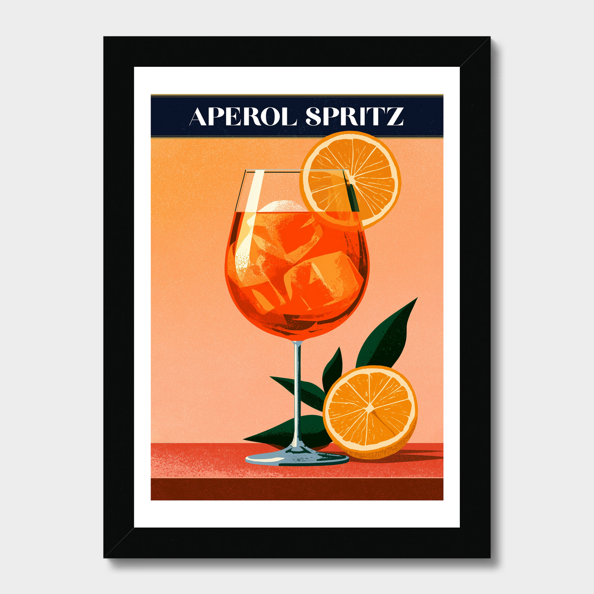 A framed vintage-style poster featuring an illustration of an Aperol Spritz cocktail with orange slices and green leaves on a peach background, with the text 'APEROL SPRITZ' at the top. The print is mounted with a white border and enclosed in a black frame, shown against a light gray background.