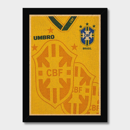 Framed wall art featuring a yellow Brazil soccer jersey design with the CBF crest, Umbro logo, and stars, shown in a black frame against a light gray background.