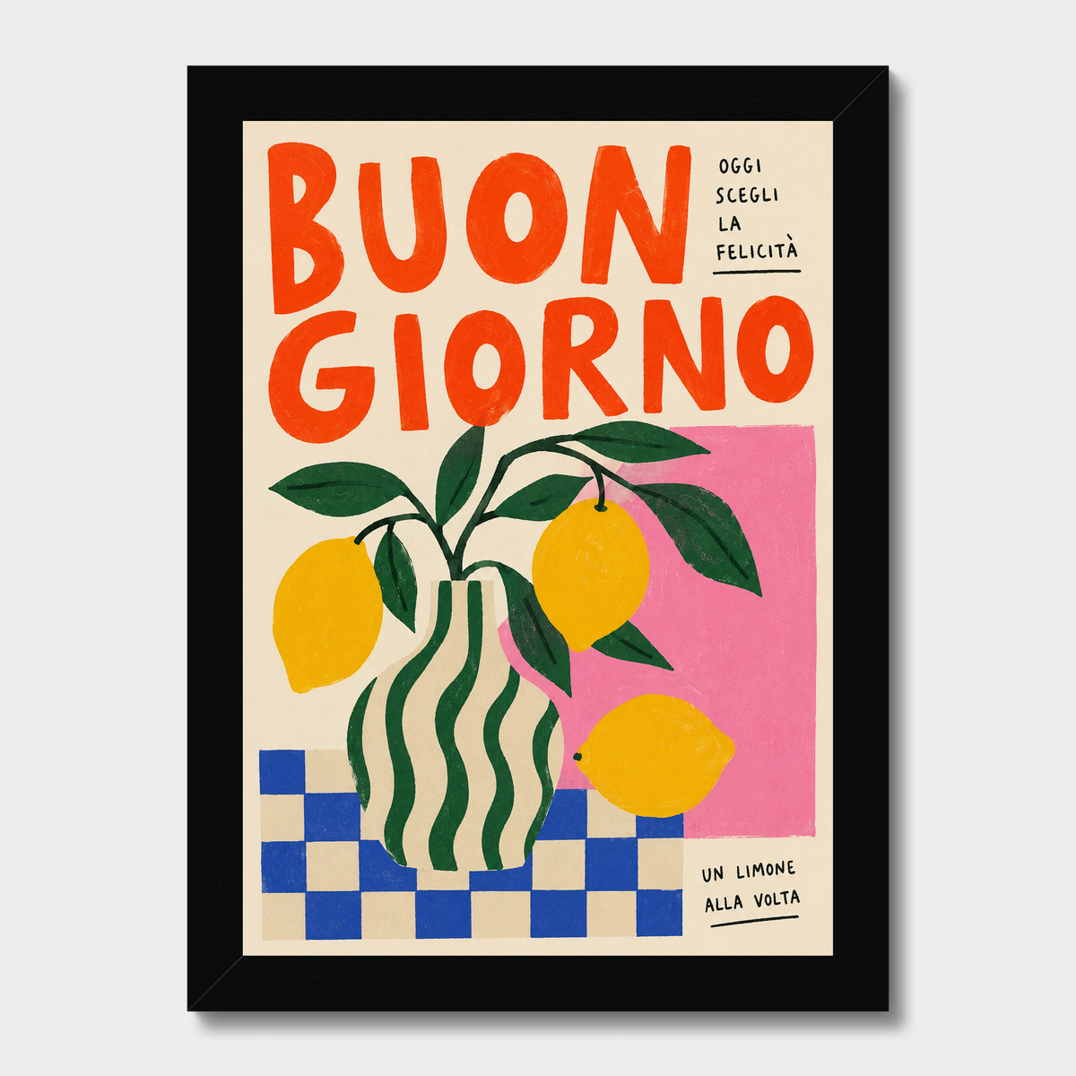 A framed Italian art print featuring a vintage-style illustration of lemons in a striped vase against a pink background, with bold orange text reading 'BUON GIORNO' and smaller text in the top right and bottom right.