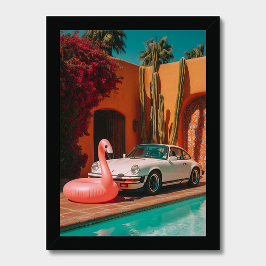 Vintage car by a pool with a pink flamingo floaty in a tropical setting