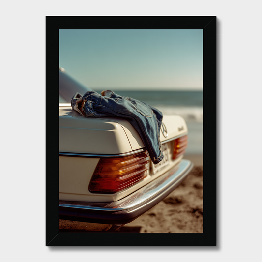 Vintage car with denim jacket on a beach