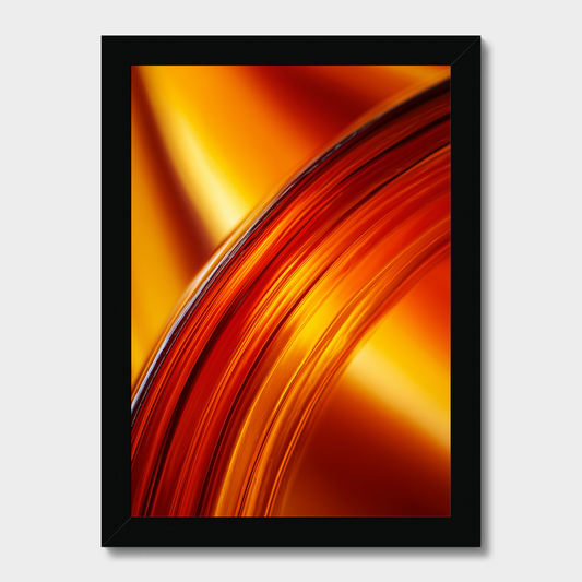 A framed abstract art print featuring flowing, curved bands of orange, red, and yellow with a glossy, metallic look, set in a simple black frame against a light gray background.