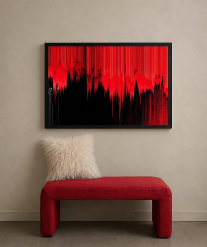 A framed abstract canvas print with a bold red and black dripping design, displayed on a beige wall above a red bench with a white fluffy pillow.