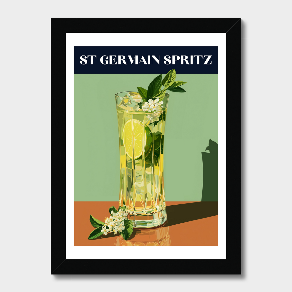 A framed art print featuring a retro-style illustration of a St. Germain Spritz cocktail glass with a lime slice, mint leaves, and white flowers, set against a sage green background with a dark navy header.