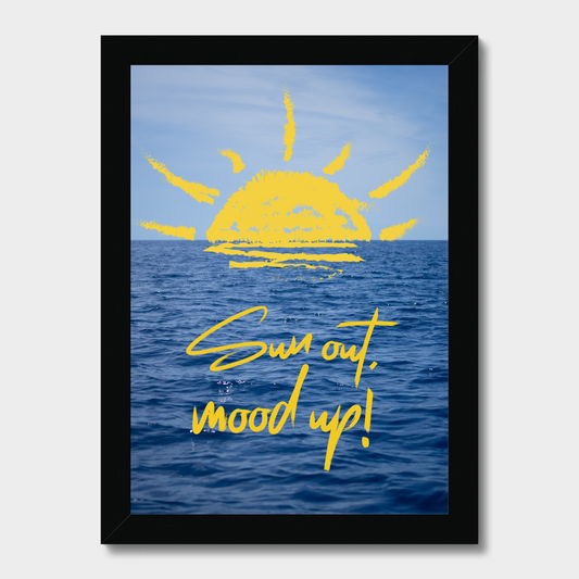 Framed artwork with a yellow sun and 'Sun out, mood up!' text over an ocean background.