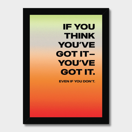 A framed motivational poster with a black frame and a bold black text quote over a vertical gradient background that transitions from pale yellow-green at the top to orange and red at the bottom, shown on a light gray background.